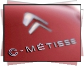 Emblemat, C-Metisse